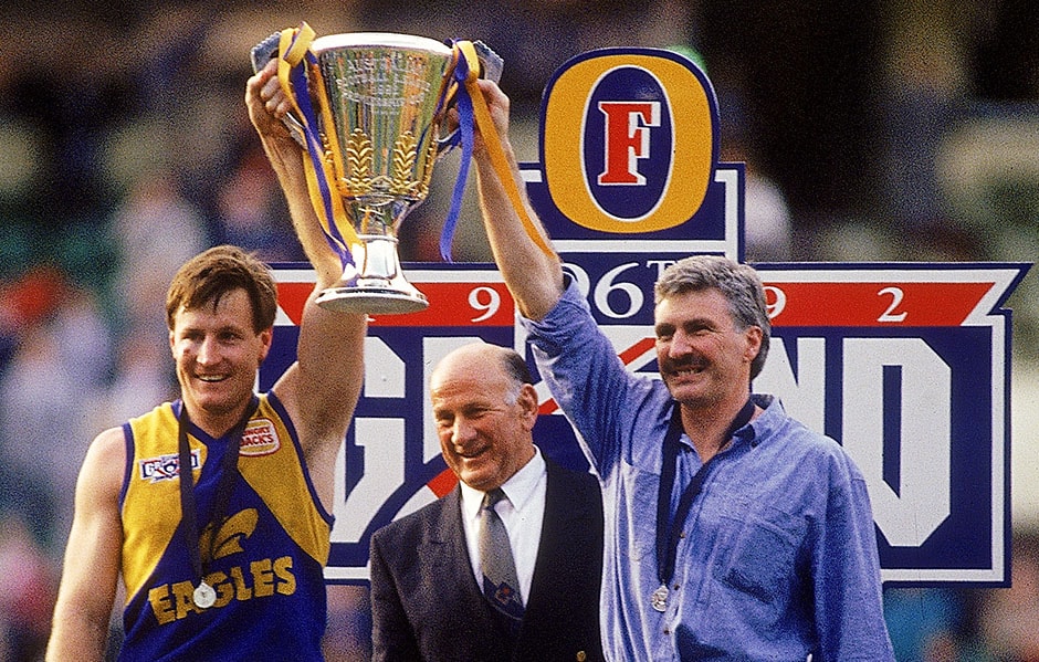 AFL 1992 Grand Final - Geelong v West Coast Team captain John Worsfold and coach Mick Malthouse of the Eagles holds aloft the Premiership Cup after winning the 1992 AFL Grand Final between the Geelong Cats and the West Coast Eagles at the Melbourne Cricket Ground on September 26, 1992.